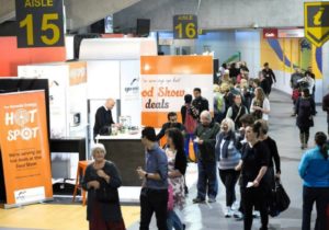 Food Show guests peruse the event marketing trade show stalls