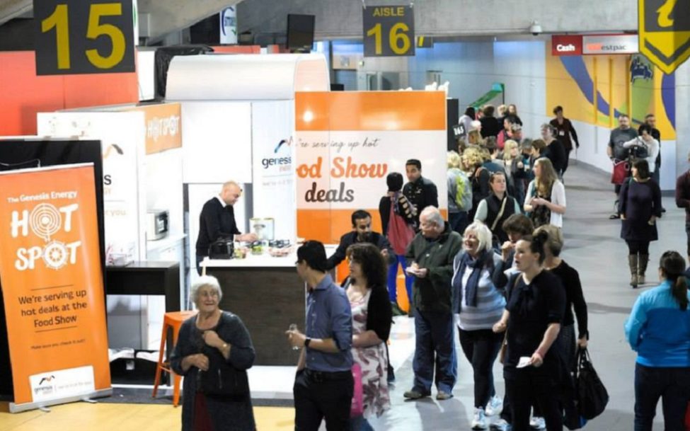 Food Show guests peruse the event marketing trade show stalls